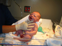BRUCE IS BORN! Getting checked out by Nurse Tammy who was fantastic