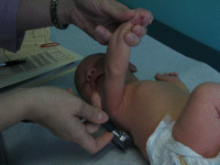 Getting checked out on his first visit to the Doc