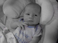 He's debating if he should pee on mommy or daddy next